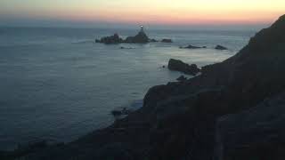 Sunset over La Corbière lighthouse Jersey [upl. by Killigrew]