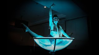 Masquerade dancer in giant martini glass at masked ball [upl. by Adamina]