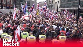 Tommy Robinson protest Thousands gather in central London as activist remains in custody [upl. by Elrak]