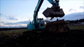 Kobelco SK235 med gallerskopa [upl. by Elfie]