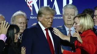 Faithbased leaders place hands on Trump as they pray for him [upl. by Euseibbob]