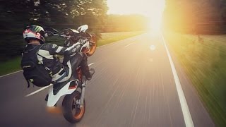 How to wheelie a motorcycle  KTM vs HUSQVARNA  Will the police get him XD [upl. by Enayr]